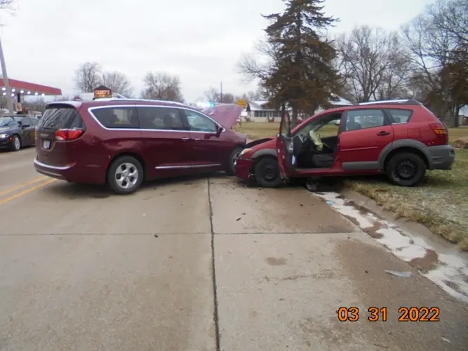 Vehicle crosses centerline, causing Wymore collision