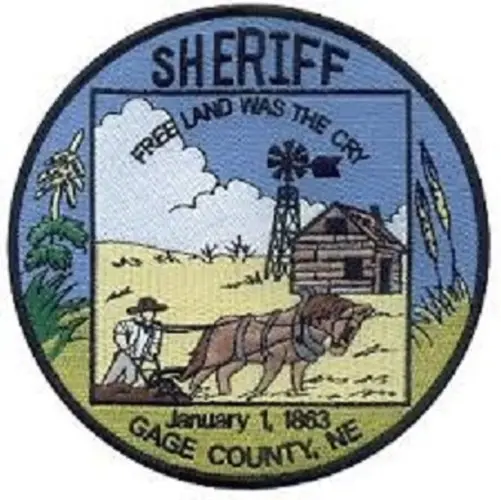 Search of Wymore home ends with arrest of forgery suspect