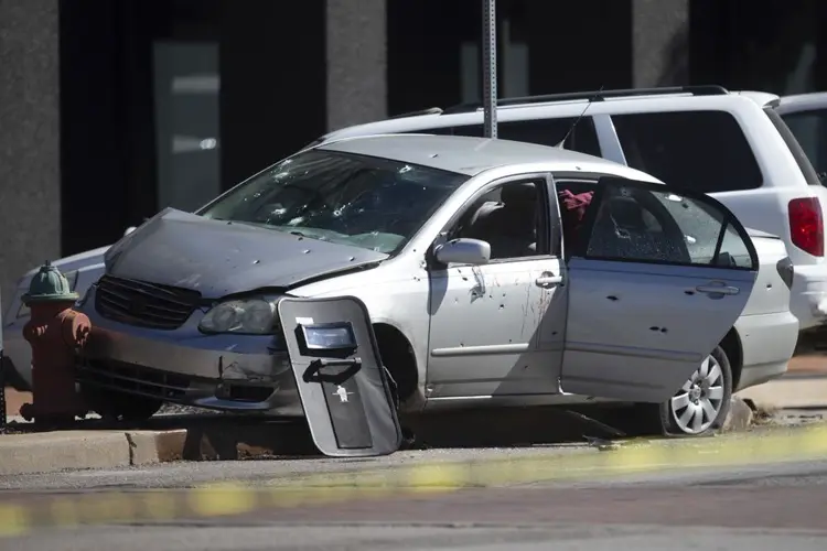 Murder suspect, officer injured in downtown Topeka shootout