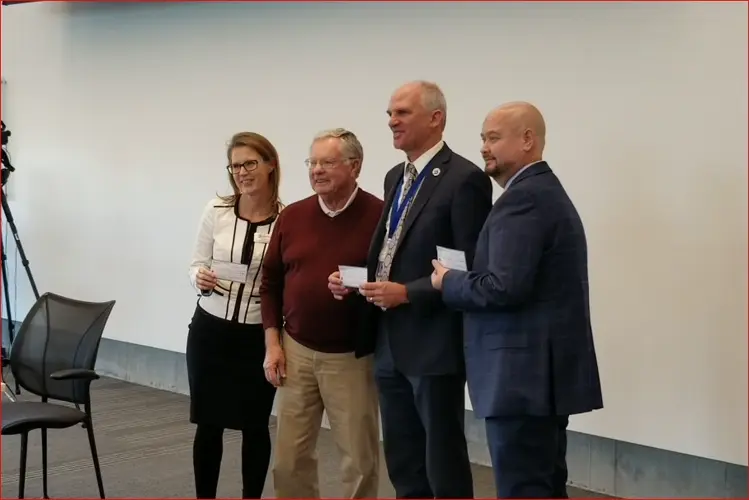 Southeast Community College receives scholarship checks, from Nebraska Open golf tournament