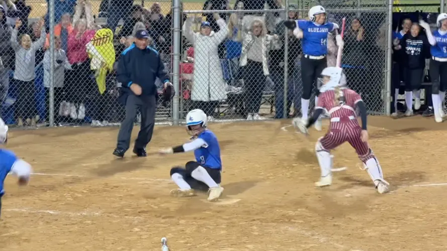 Rain, Top Teams Dominate Day One of State Softball