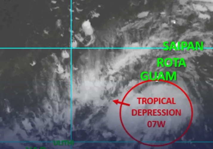 Weather system passing south of Guam upgraded to tropical depression