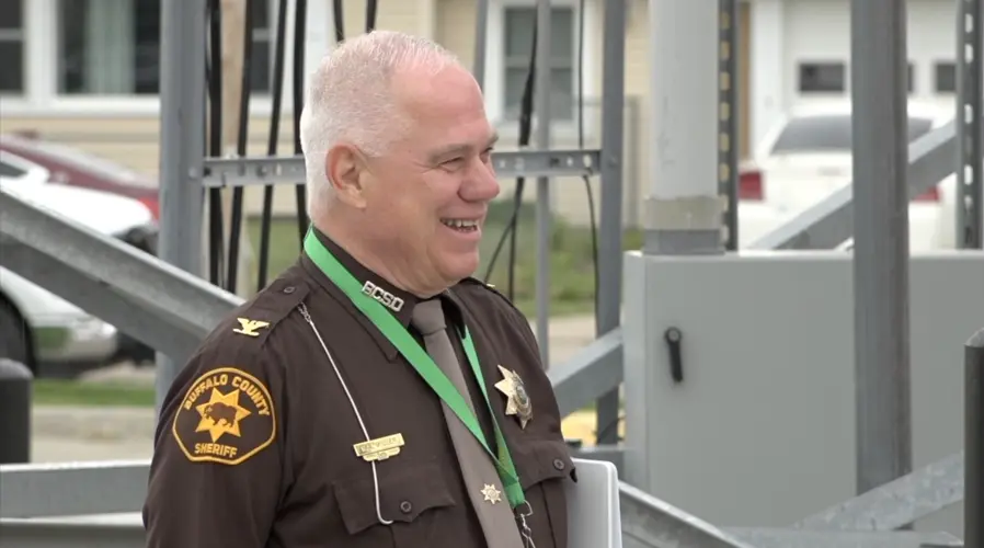 Sheriff Neil Miller presented Above and Beyond award from Buffalo County Community Partners