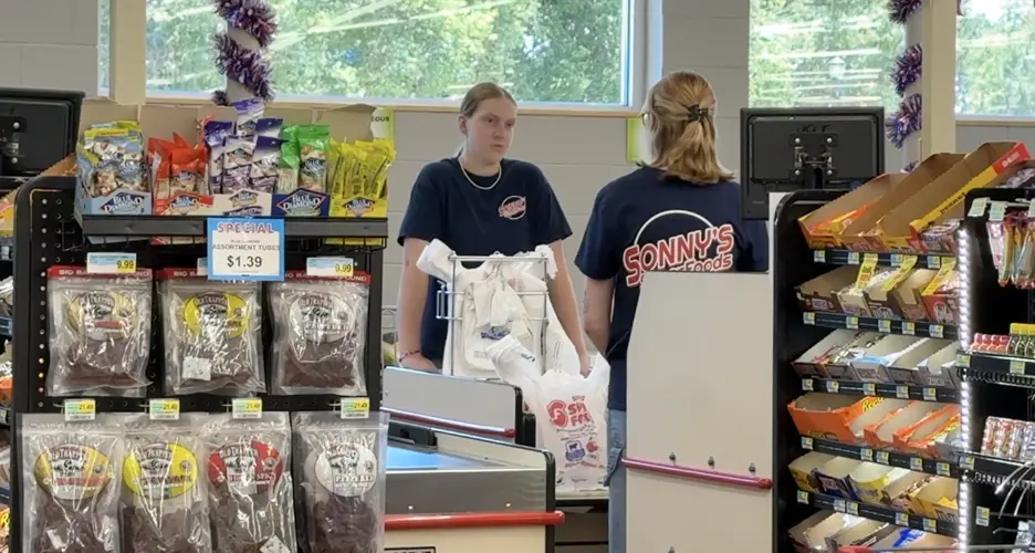 Ricketts stops at Sidney grocery, talks store’s history