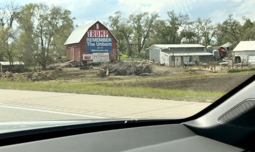 ‘Trump Barn’ regains its sign, thanks to anonymous donor and installation help