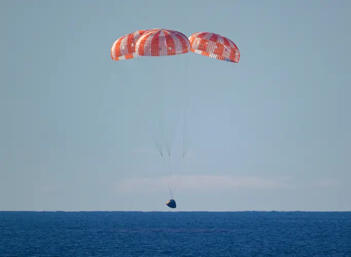 Artemis II astronauts return from moon with a splashdown to close out a record-breaking lunar voyage