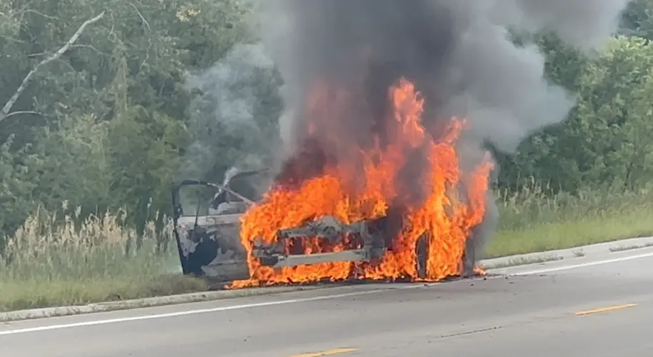 Occupants escape safely from car inferno