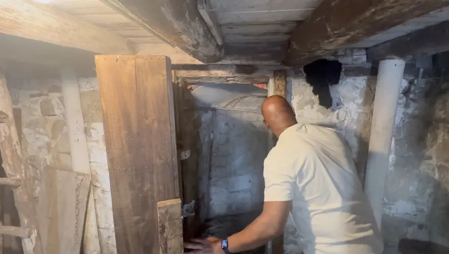 Descendant of John Brown escapees helps renew Mayhew Cabin