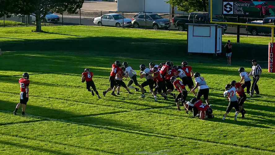 Sidney Rolls Past Sterling, 49-7