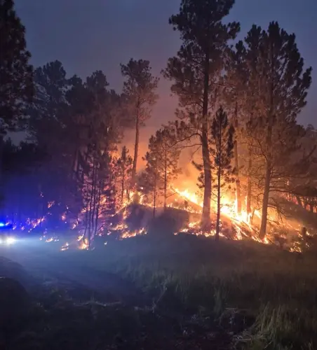 More than 20 buildings threatened as firefighters continue to make progress at fire near Crawford