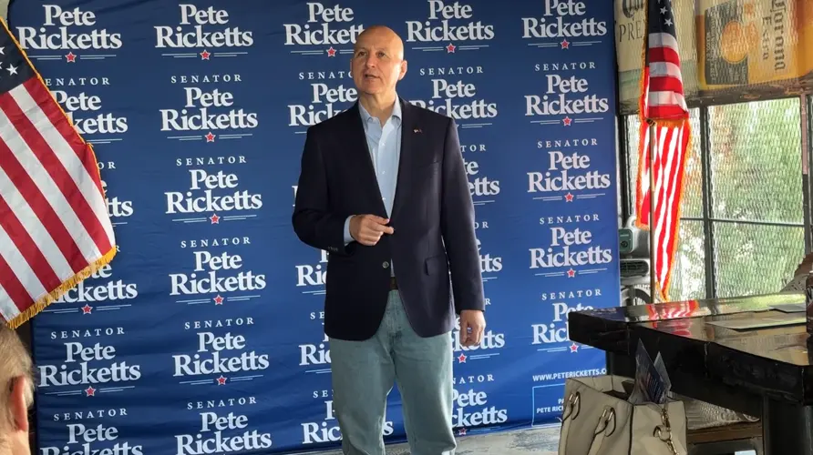 Sen. Pete Ricketts meets with supporters during Norfolk campaign event