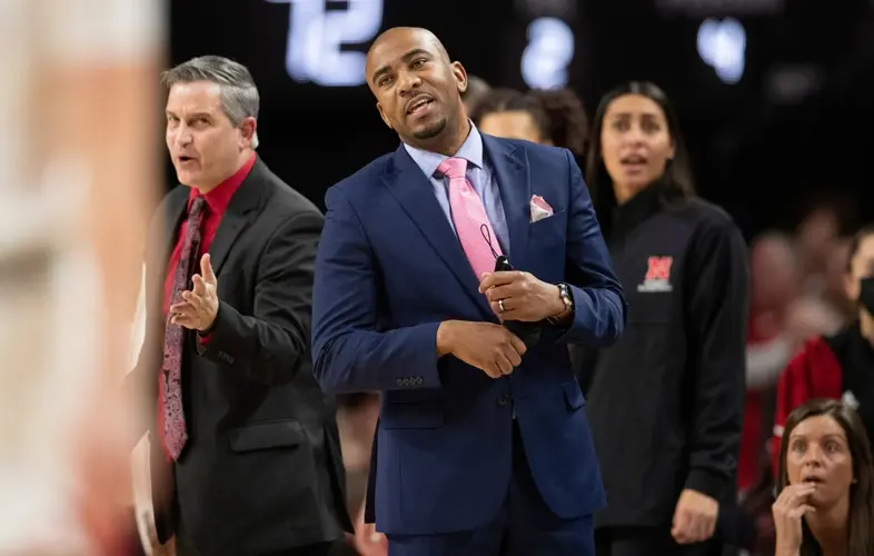 Attorney says in court papers that ex-Nebraska assistant Chuck Love admitted having sex with player