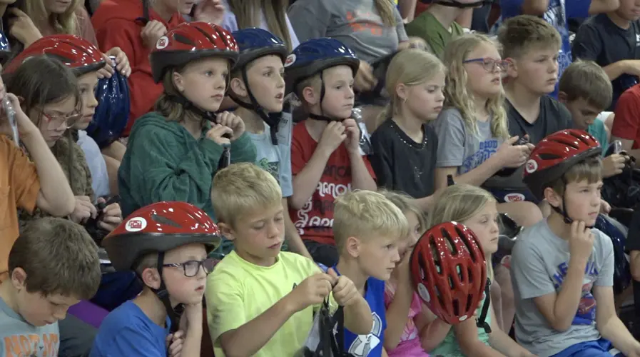 Arnold students receive helmets, school grant through Small Towns Matter program