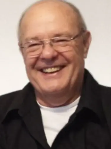 Leslie A. "Les" Tucker