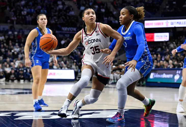 Fudd leads the way as top-ranked UConn wins its 42nd consecutive game with blowout of Creighton