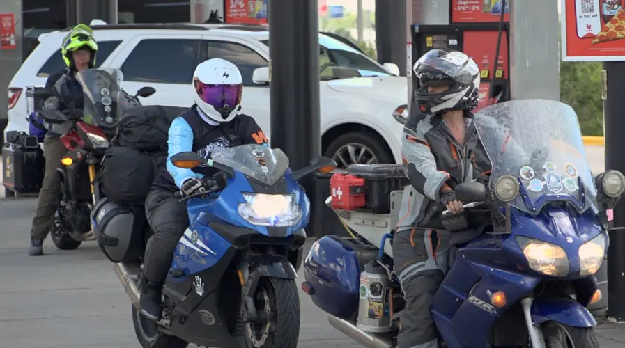 World-record riders stop in Kearney during 13,000-mile cross-country motorcycle challenge