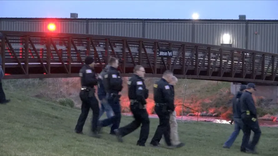 Norfolk’s Johnson Park illuminated red in honor of fallen firefighters