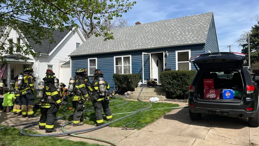 Firefighters Rescue Dogs from Hastings House Fire