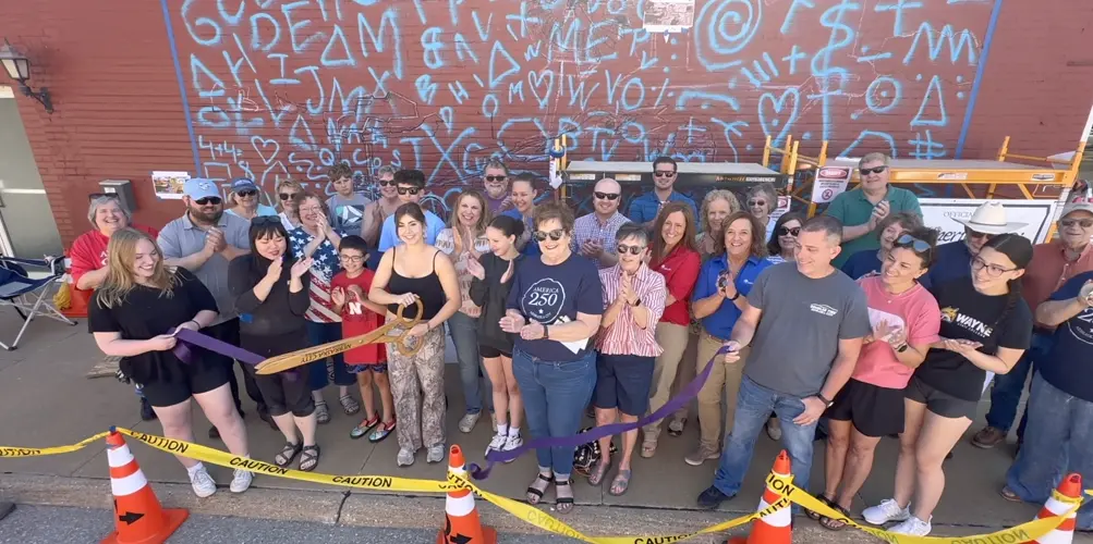 Ribbon cutting marks start of NC mural