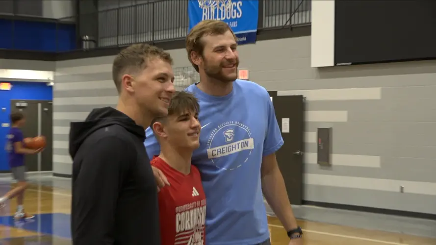 Husker and Bluejay, Jacobsen and Traudt put in-state rivalry on hold for the next generation