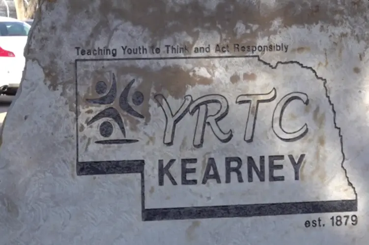Third woman charged with sex assault at Kearney YRTC