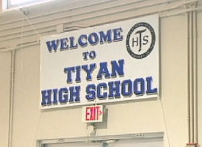Non-profit group owns Tiyan High campus; school expected to reopen August 31