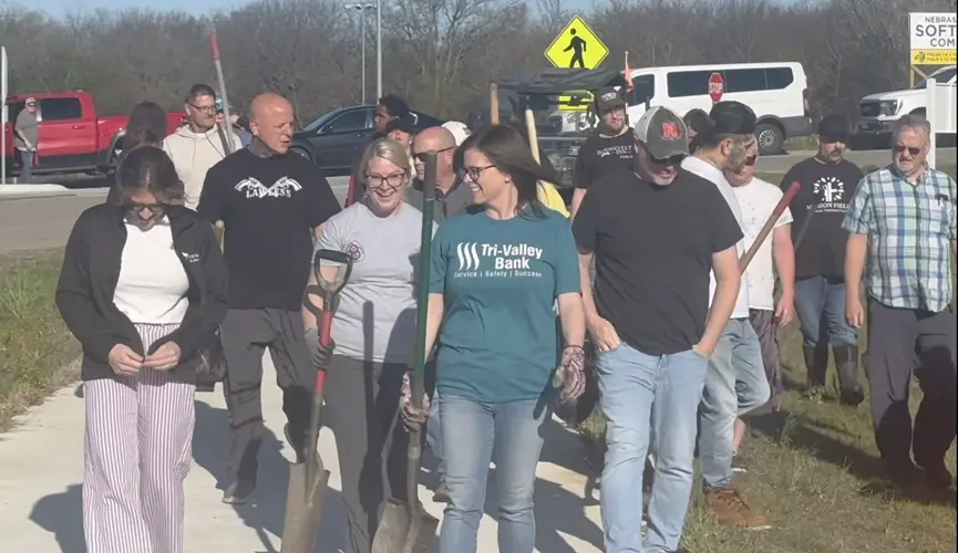 Volunteers transform trail with 100+ trees